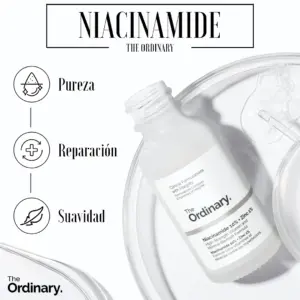 Sérum facial Niacinamida 10% y Zinc 1% de The Ordinary en frasco de vidrio esmerilado con gotero, junto a platos de vidrio y gotas transparentes.